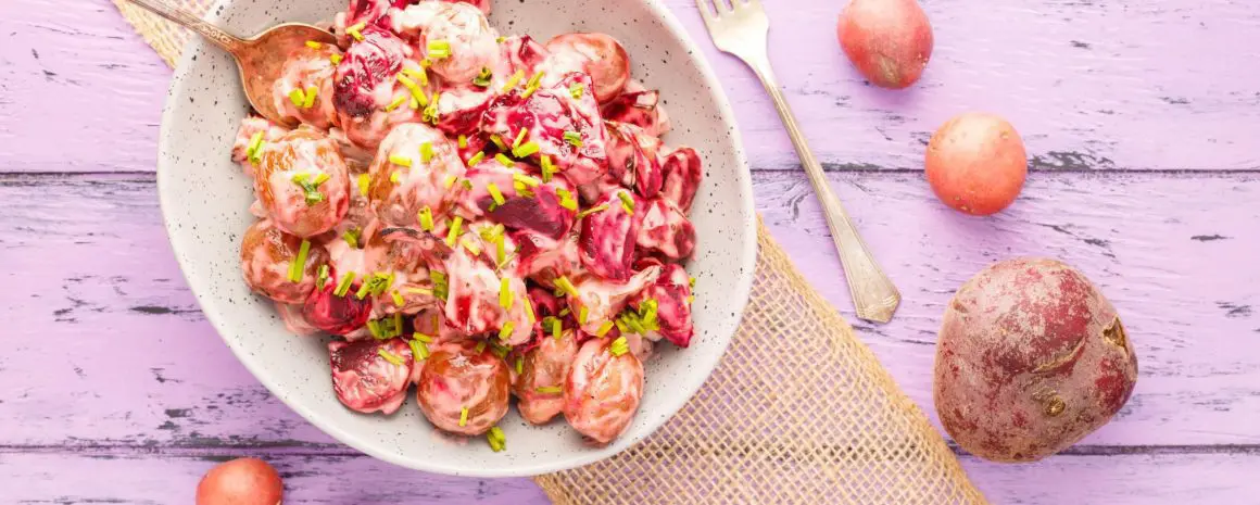 A bowl of roasted beet and potato salad.