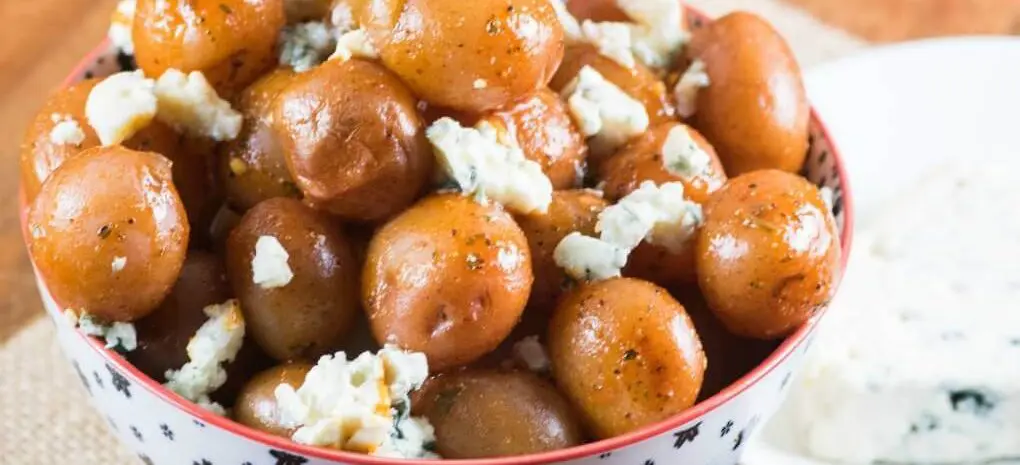 A bowl of buffalo wing little potatoes.