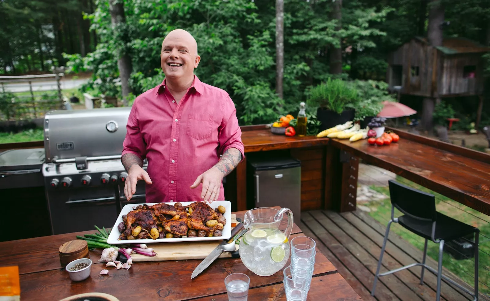 Chef Antoine Sicotte in his backyard with some delicious grilled foods.