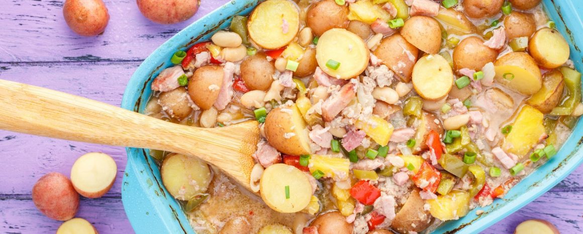 A baking dish of Hawaiian Potato Casserole.