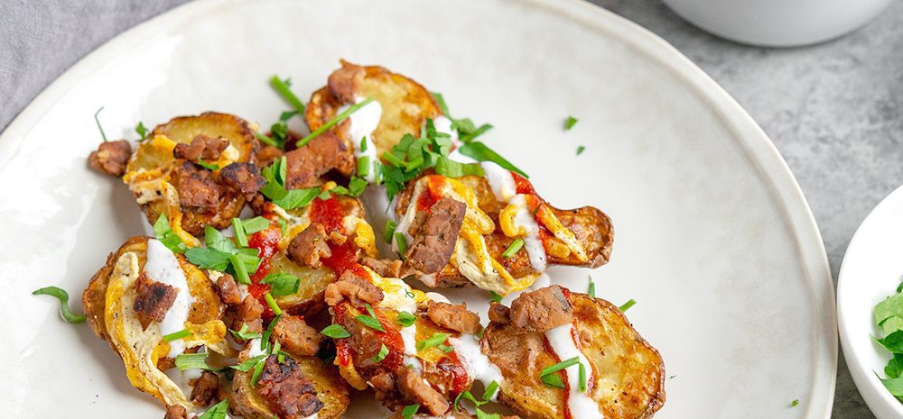 A plate of potato skin nachos that were made in the Air Fryer.