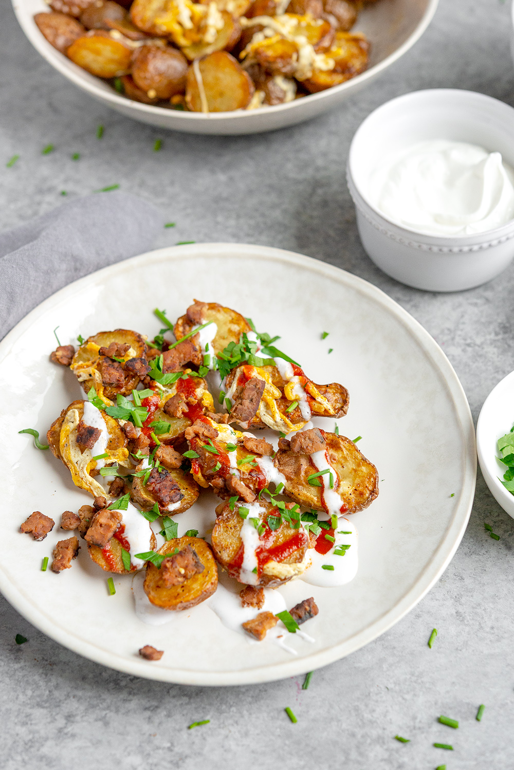 A plate of potato skin nachos that were made in the Air Fryer.
