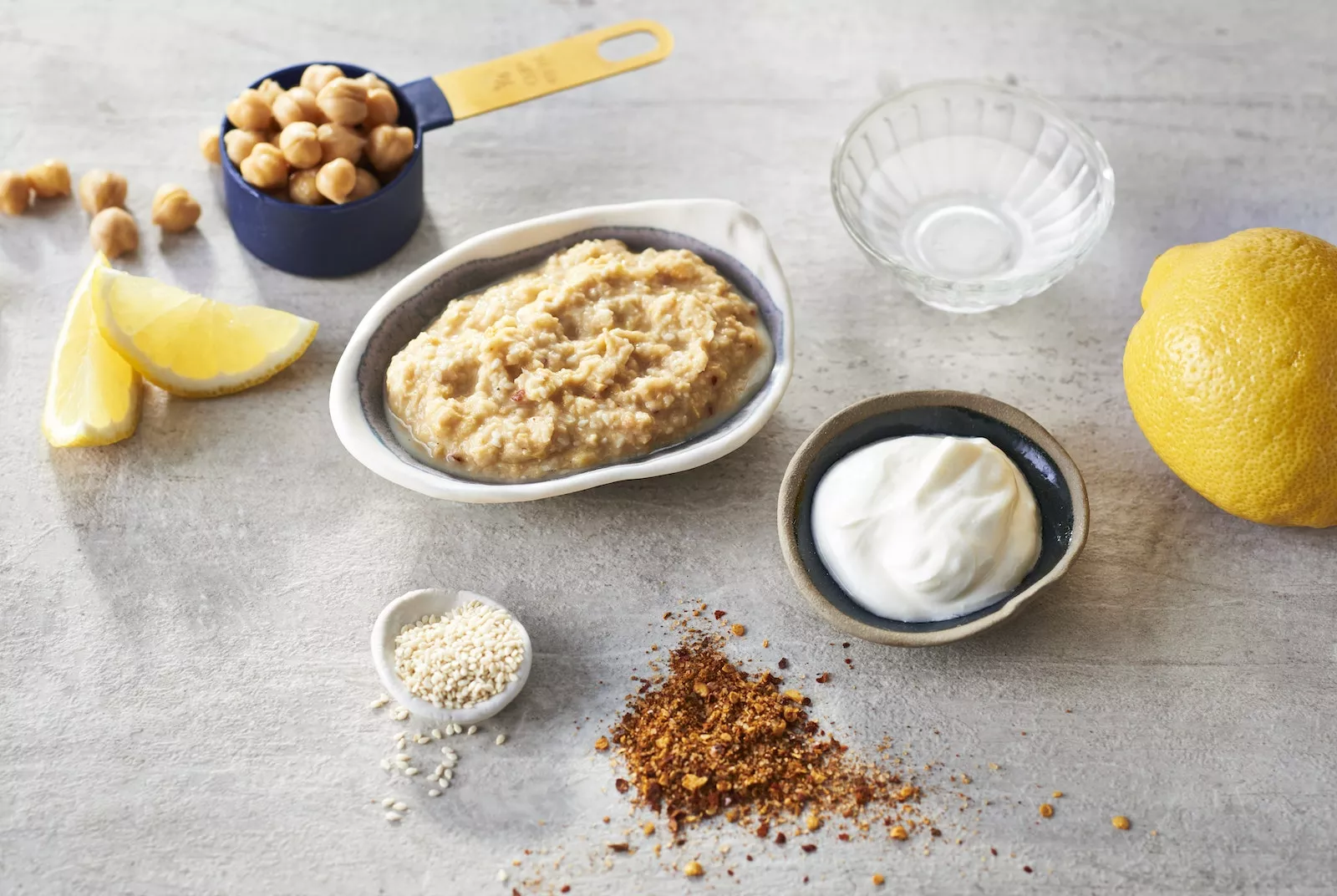 Smashed Potatoes with Chickpea Delight Dip_The Food Group_Web Res 1 Some cute little bowls with dips including some chickpea delight dip.