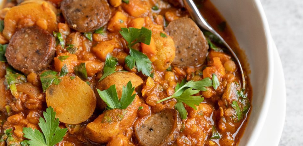 A bowl of Lentil, Potato, and Sausage Stew.