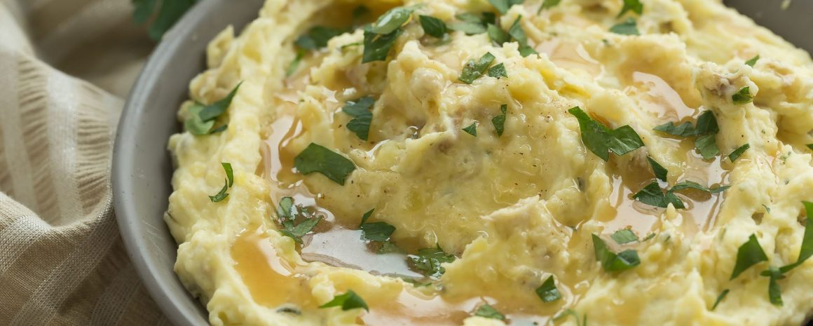 Boursin cheese mashed potatoes in a bowl.