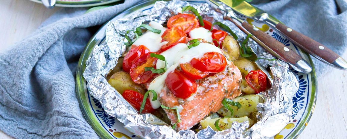 Caprese salmon foil packets.