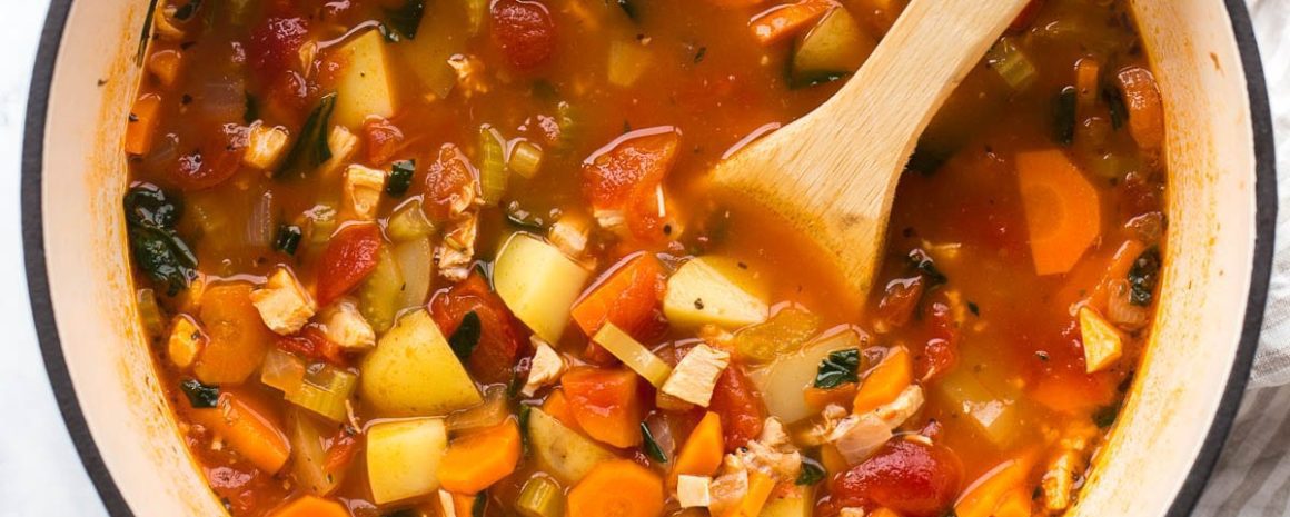 A pot of chicken vegetable soup.