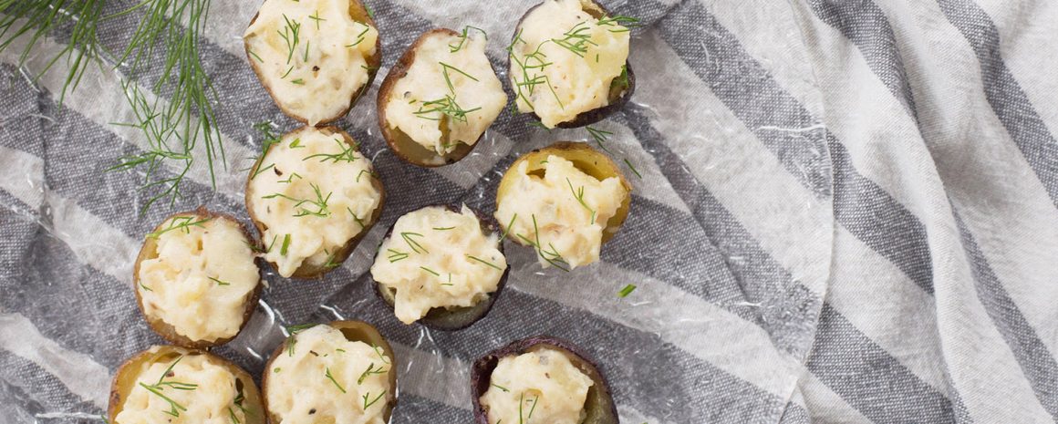 Devilled potatoes on a glass plate.