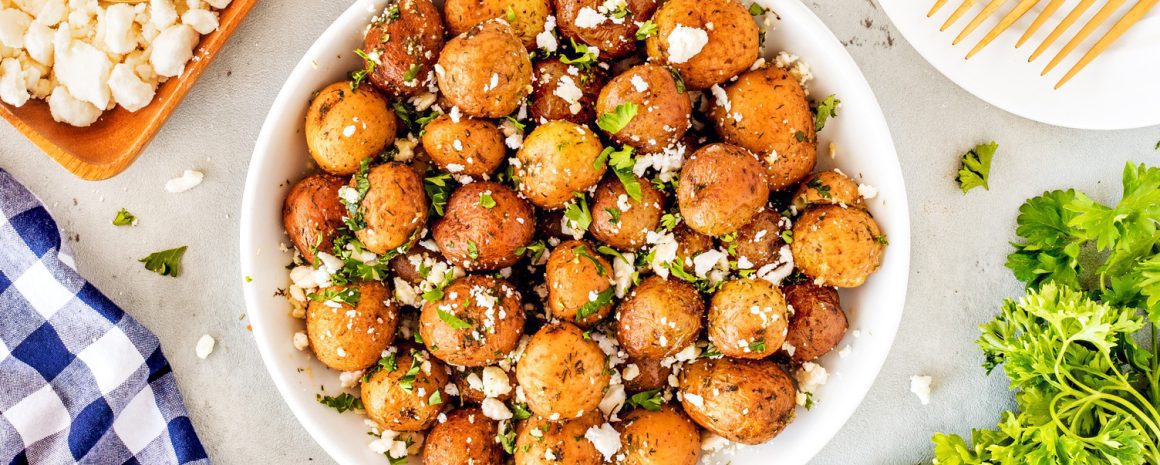 A bowl of Easy Lemon Feta Mediterranean Potatoes.