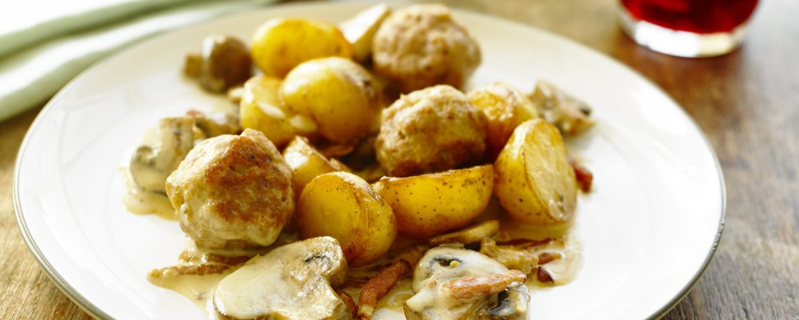 Mushroom potato casserole with meatballs.