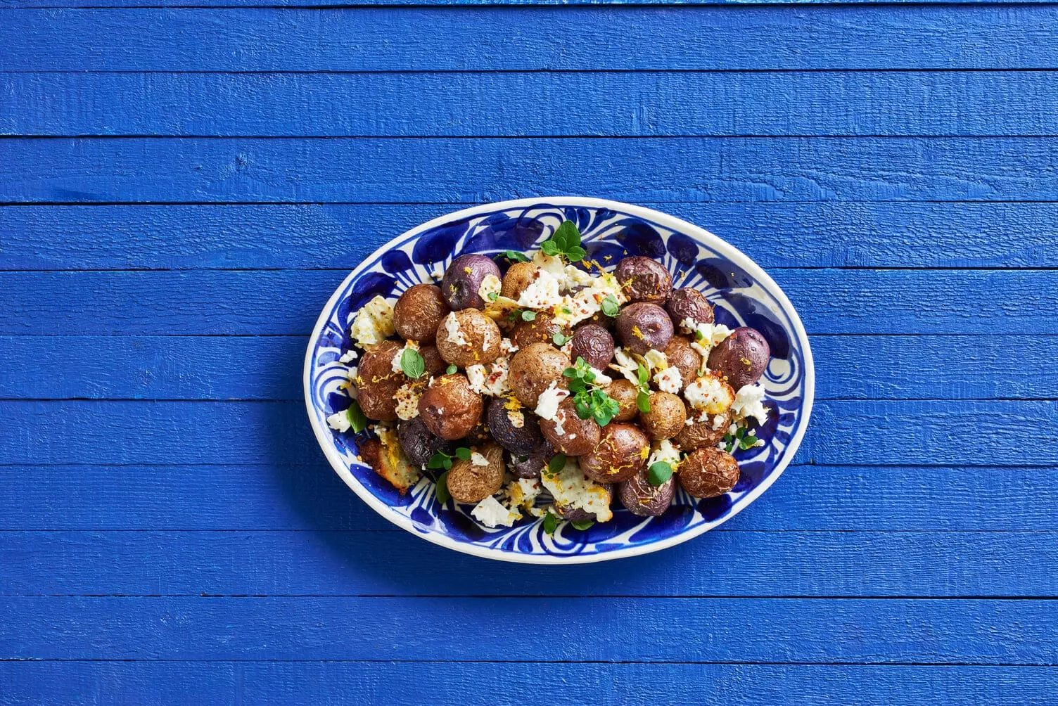 Greek-Feta-Roasted-Potatoes_The-Food-Group_Web-Res-1 A nice big platter of Greek feta roasted little potatoes.