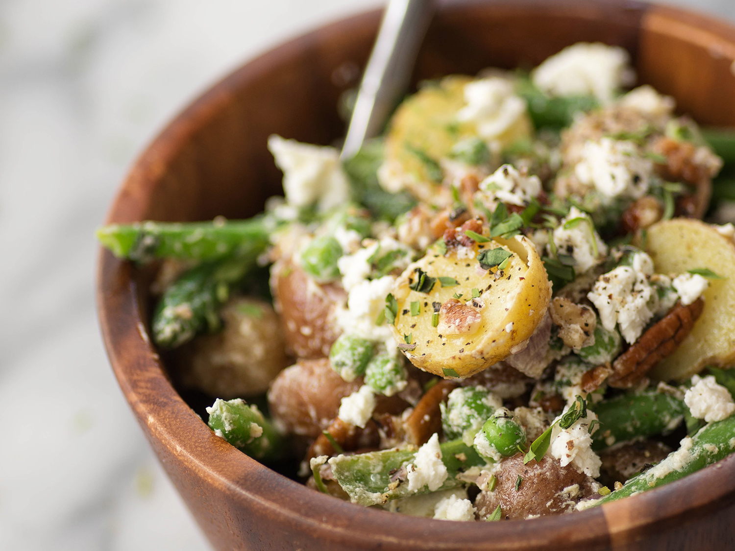 A bowl of green bean and tarragon potato salad.