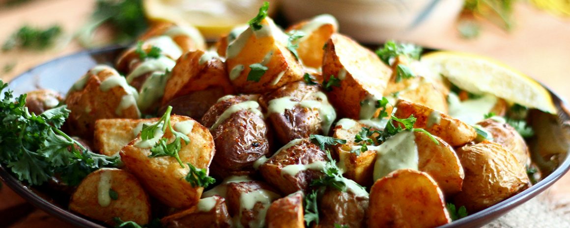 Crispy potatoes with garlic lemon avocado aioli.