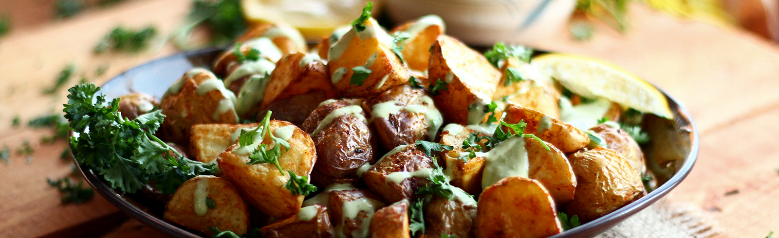 Crispy potatoes with garlic lemon avocado aioli.