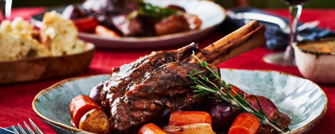 Lamb shank with potatoes.