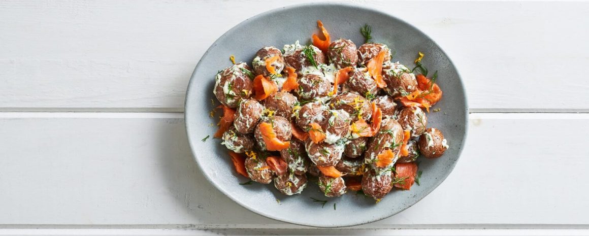 Smoked salmon lox roasted potatoes in a nice little platter.