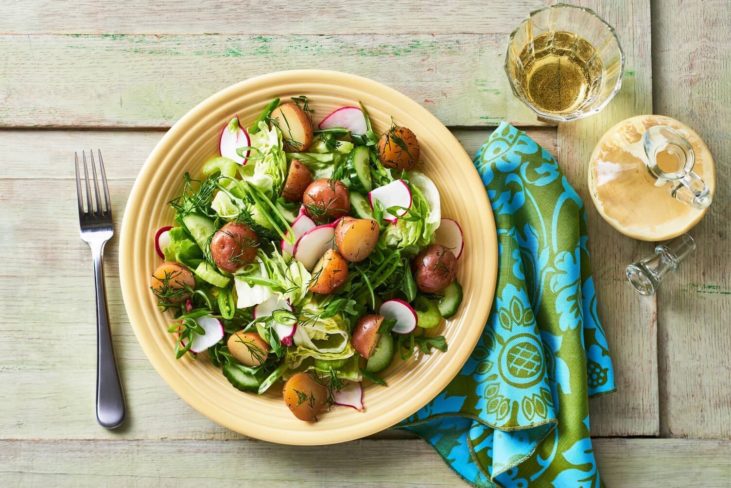 A mixed green salad with Dijon vinaigrette.