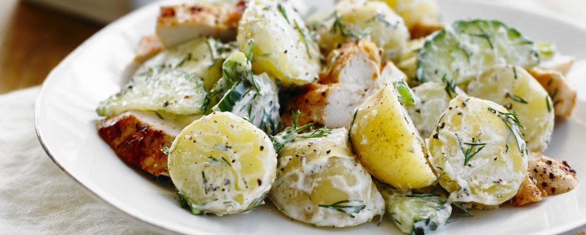 Chicken breast with creamy dill potatoes and cucumber salad.