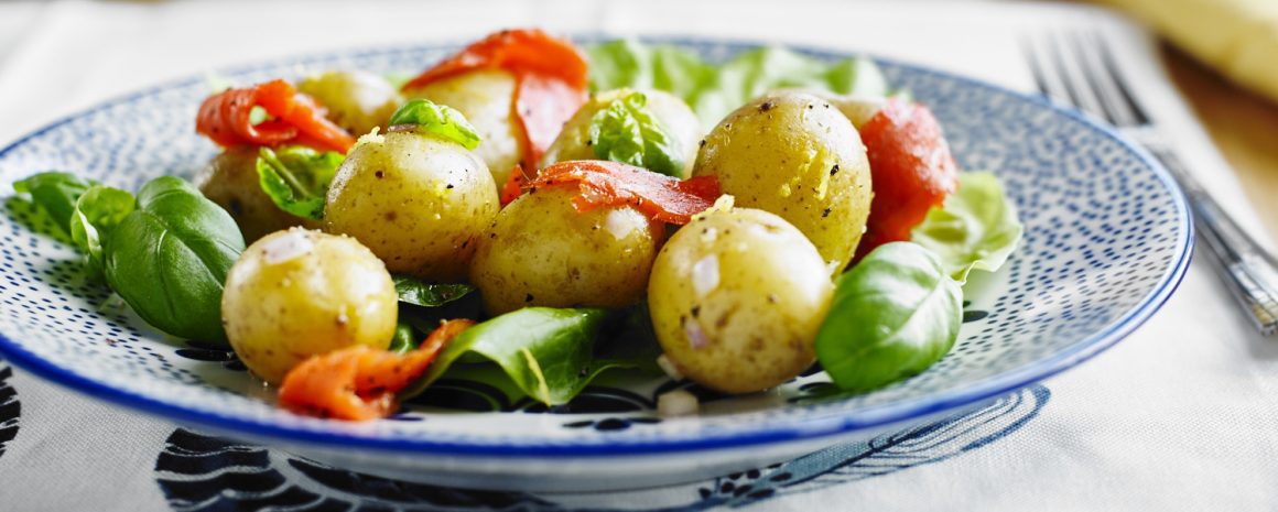 Potatoes with smoked salmon and basil.