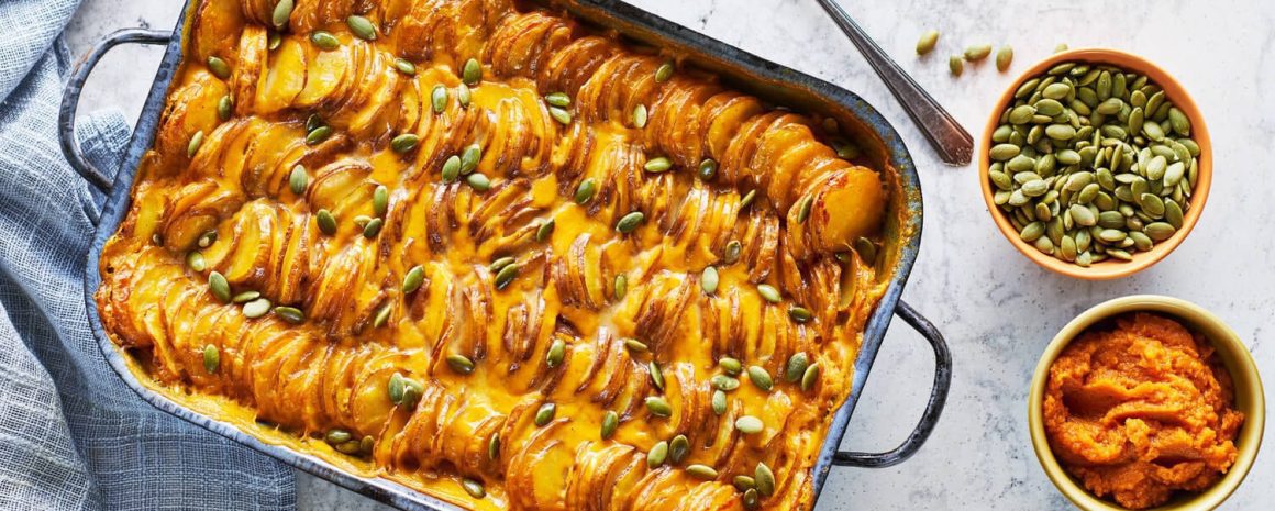 A nice baking dish of pumpkin scalloped potatoes.