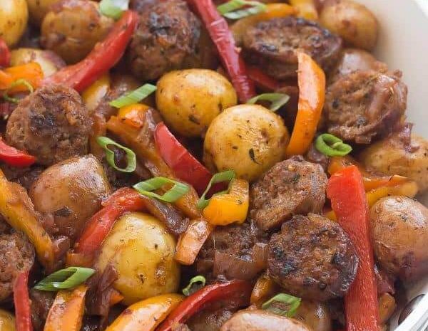 A bowl of grilled veggies and potatoes.