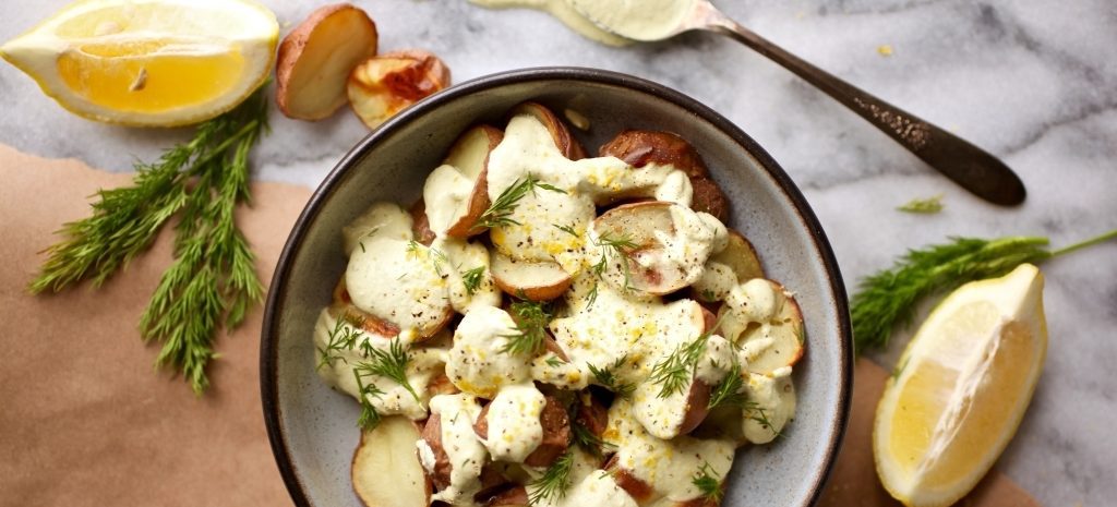 Roasted potatoes with creamy cashew lemon dill sauce.