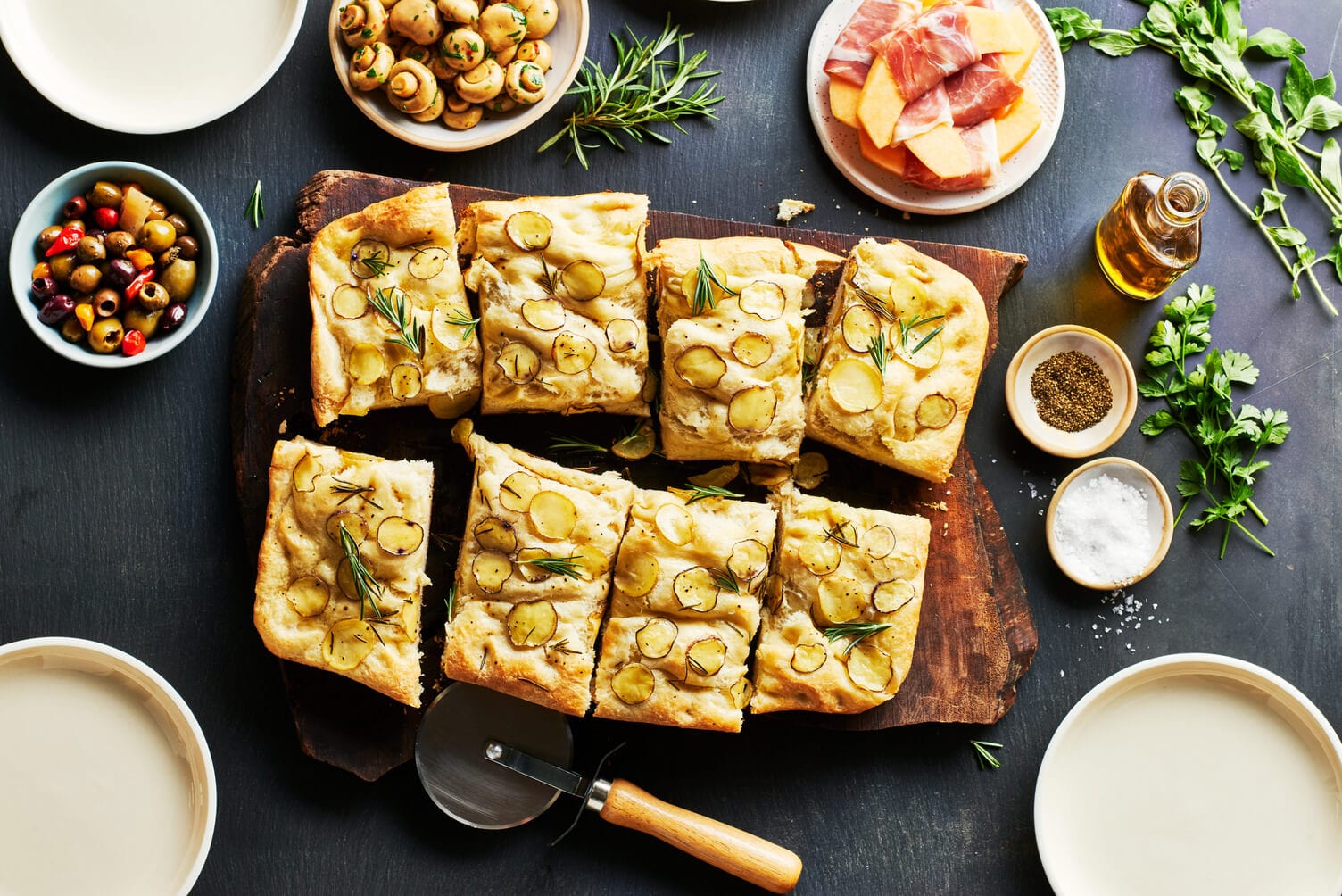 Easy rosemary focaccia cut into nice little squares.