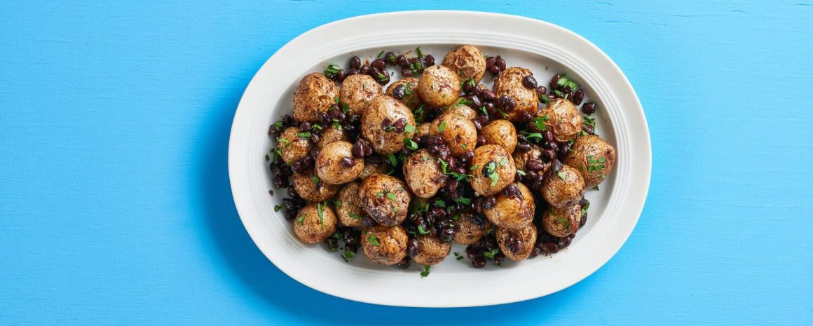 A plate of spicy black bean roasted potatoes