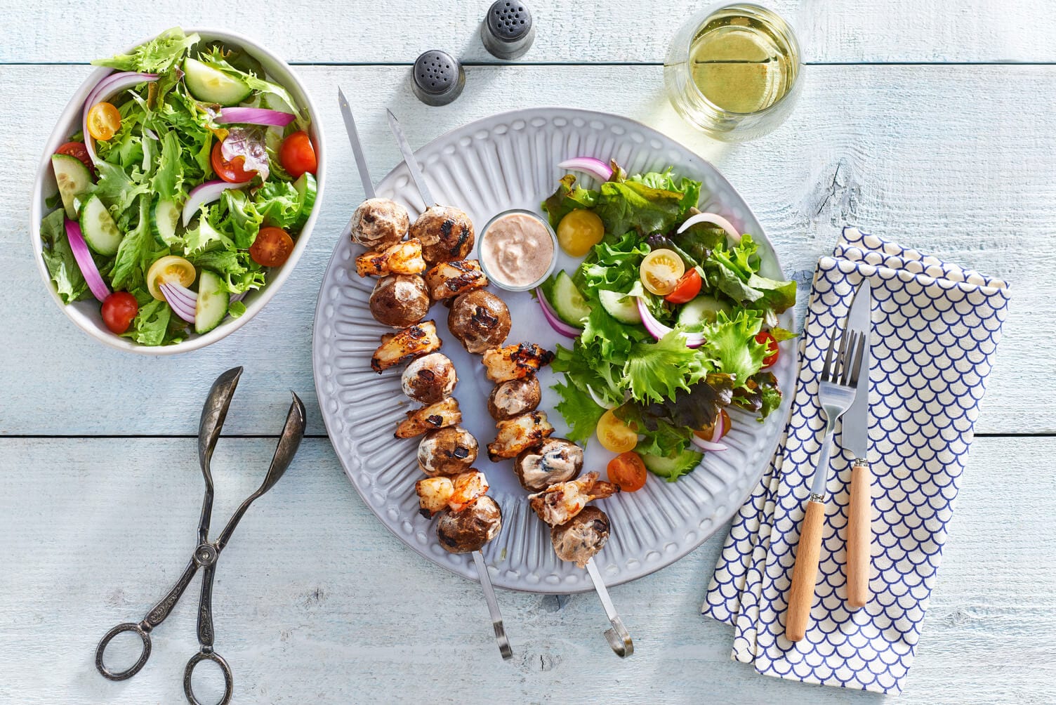 Tandoori shrimp potato skewers with little potatoes.