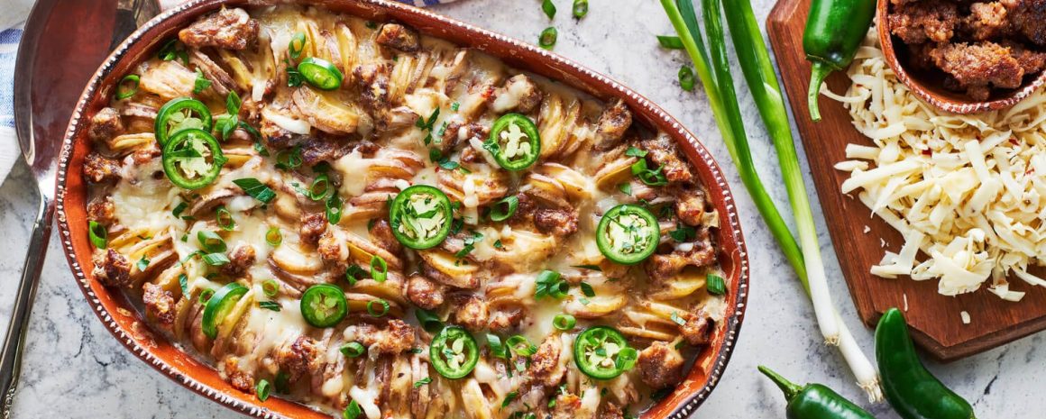 A casserole dish of Tex-Mex scalloped potatoes.