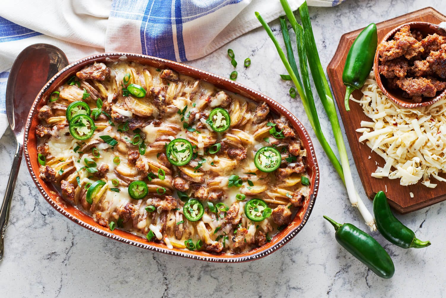 A casserole dish of Tex-Mex scalloped potatoes.