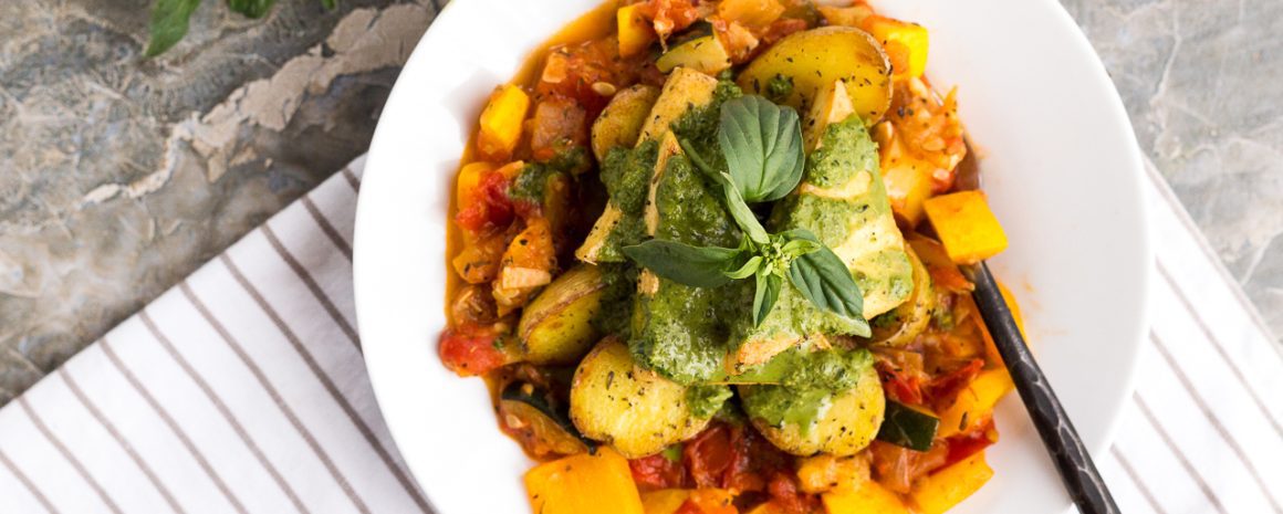 A bowl of tofu and potatoes provençale.