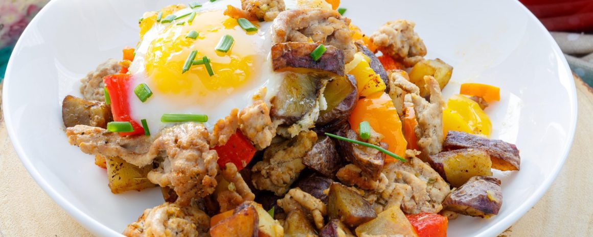 A turkey potato hash in a bowl.