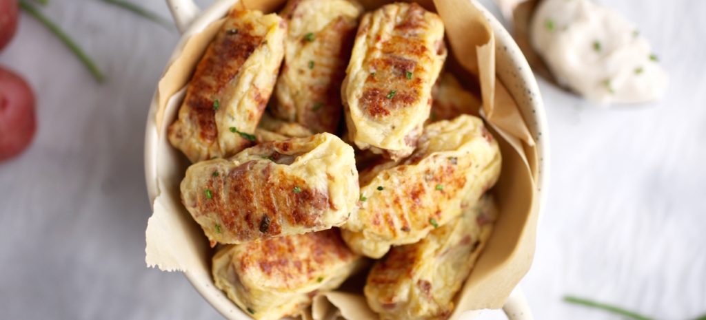 Baked tater tots in a bowl.